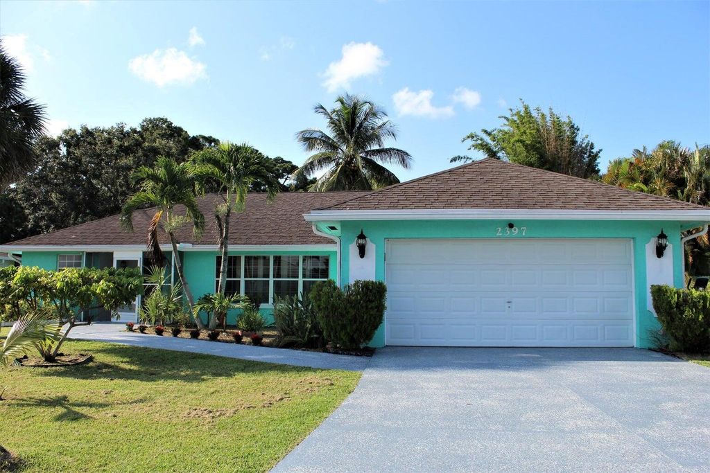 Photo of 2397 SE Gillette Avenue, Port Saint Lucie, FL 34952 (MLS # R11001275)