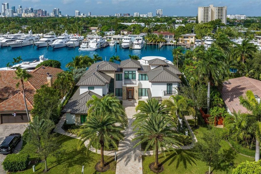 Nestled in the prestigious Sunrise Intracoastal enclave, this stunning estate spans 6,994 ACSF with a bottom floor elevation approaching 8 ft! A generous 123' of prime WF, a sleek contemporary design, private elevator & an open entertaining area seamlessly connect to a chef's kitchen & dining room. A VIP suite & private home cinema complete the ground level. The grand primary suite is complete with lavish dual bathrooms, separate walk-in closets and an oversized terrace. Outside, the serene waterfront vista is complemented by a sophisticated entertainment area, where luxury meets nature's beauty. Experience the pinnacle of South Florida luxury living! Beach, shopping and dining just minutes away! Property is presently 4 true suites, with the ability to add 2 more for a total of 6 beds.