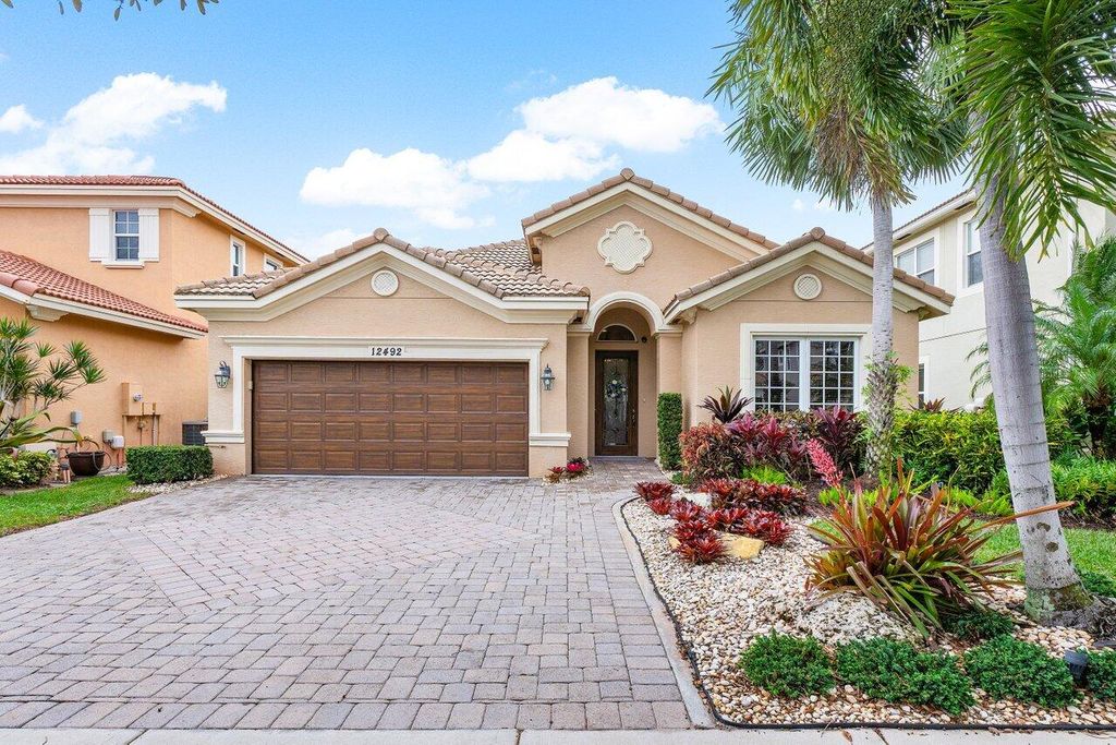 Photo of 12492 Aviles Circle, Palm Beach Gardens, FL 33418 (MLS # R10951460)