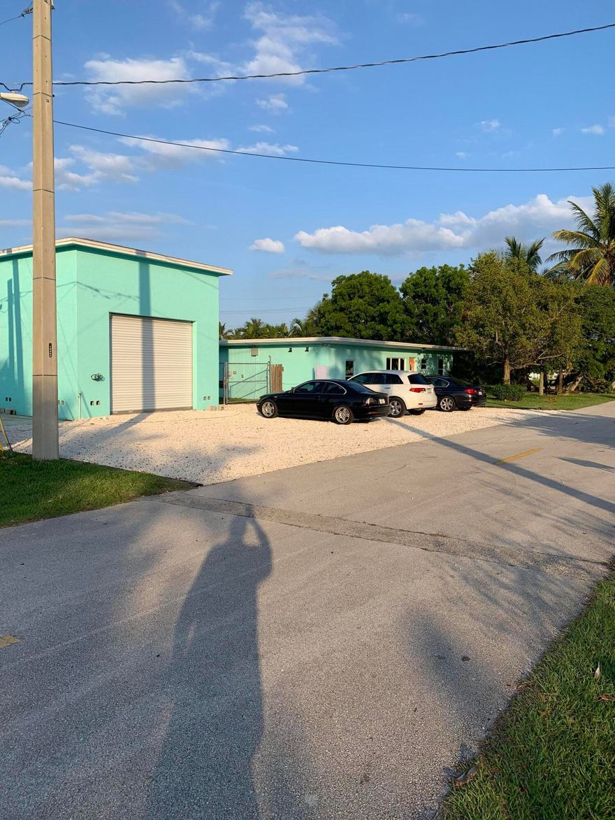 Complete Professional Re Build.  Top quality WPB Contractor. Ground up Electrical  Design/Install Utility to Code. Modern Hi line lighting, interior &  exterior outlets  including complete  ground up re-wire both buildings , 30 and 50 amp service inside/outside, Generac Pw box for back up generator. 2 Story concrete block GAR over slab ,modern energy saving inside/inside/outside lighting/outlets. Complete modern updated plumbing Residence & Garage. ( septic hook up for RV, Motor Home )  w/ 50' x 16' concrete slab W/plenty of room for 2 20'x 8'-12' Storage units. Create your own vision for this great location with large mezzanine space between Residence and Two Story Garage W 2nd Floor Office. Local comp slightly smaller and needs upgrades S4$590K .All  heavy work done! Pref Location! EZ $ Great Location for Home Contractor, Home Import/Export, Custom Design Studio, Landscape Business, Private Secure Storage. Professional Architechs raise the Roof up to three stories for Direct Water Views over 2 million dollar homes! Blow away new town homes on Seaway Dr. Any way you slice it!  Empty nesters moving to Condo.  Serious Inquires bring your Architect or GC along.