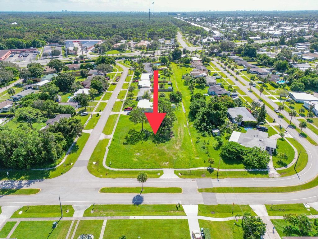 Photo of 180 Princess Drive, Port Saint Lucie, FL 34952 (MLS # R10915327)