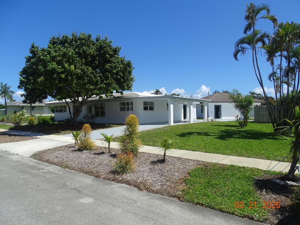 Photo of 4822 NW 2nd Terrace, Boca Raton, FL 33431 (MLS # B26007075)