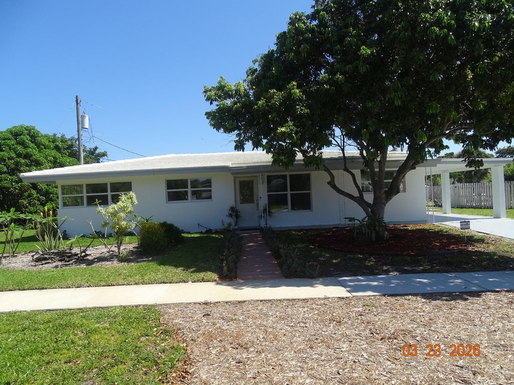 Photo of 4822 NW 2nd Terrace, Boca Raton, FL 33431 (MLS # B26007075)