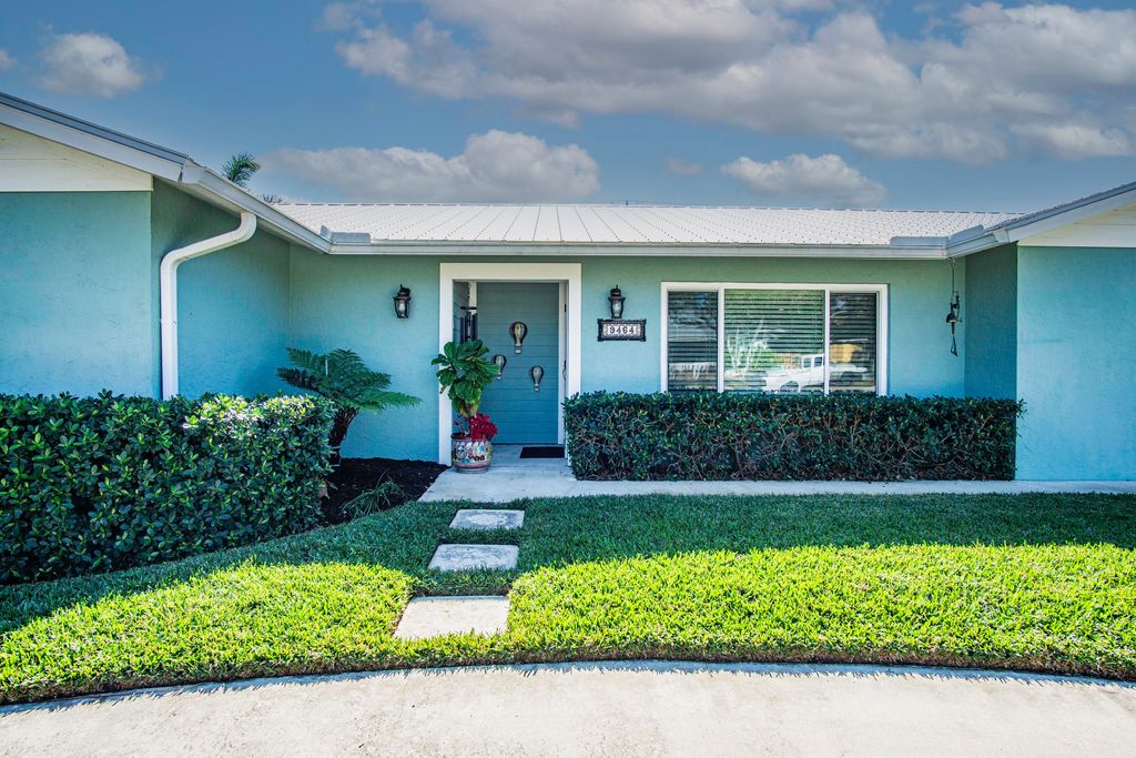 Photo of 9464 SE Saturn Street, Hobe Sound, FL 33455 (MLS # R11157981)