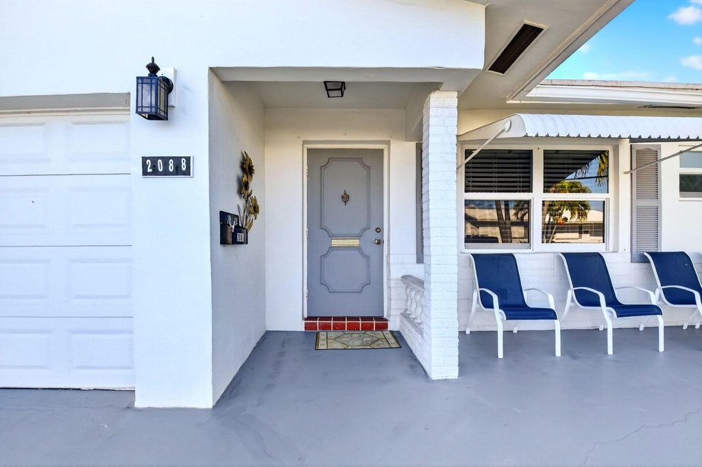 Photo of 2088 SW 14th Avenue, Boynton Beach, FL 33426 (MLS # R11143766)