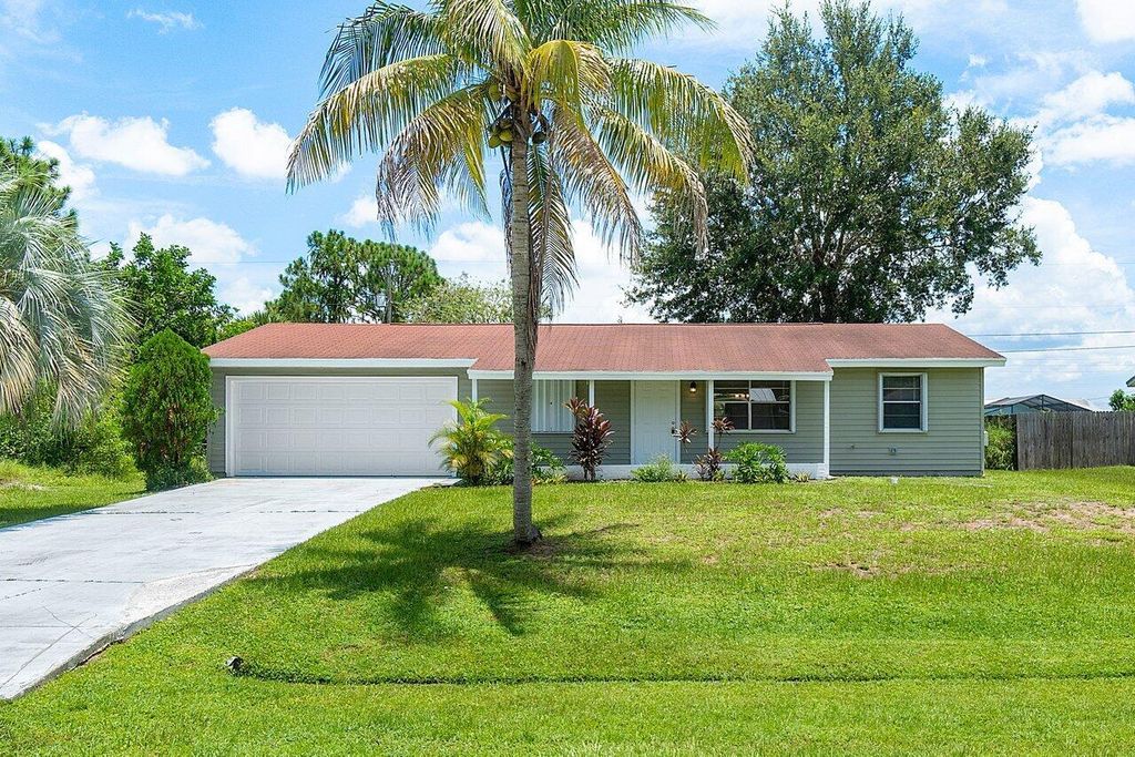 Photo of 1925 SW Idaho Lane, Port St Lucie, FL 34953 (MLS # R10910479)