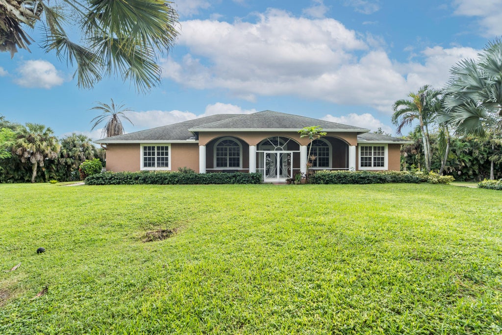 Photo of 16970 W BURNS Drive W, The Acreage, FL 33470 (MLS # B26089695)