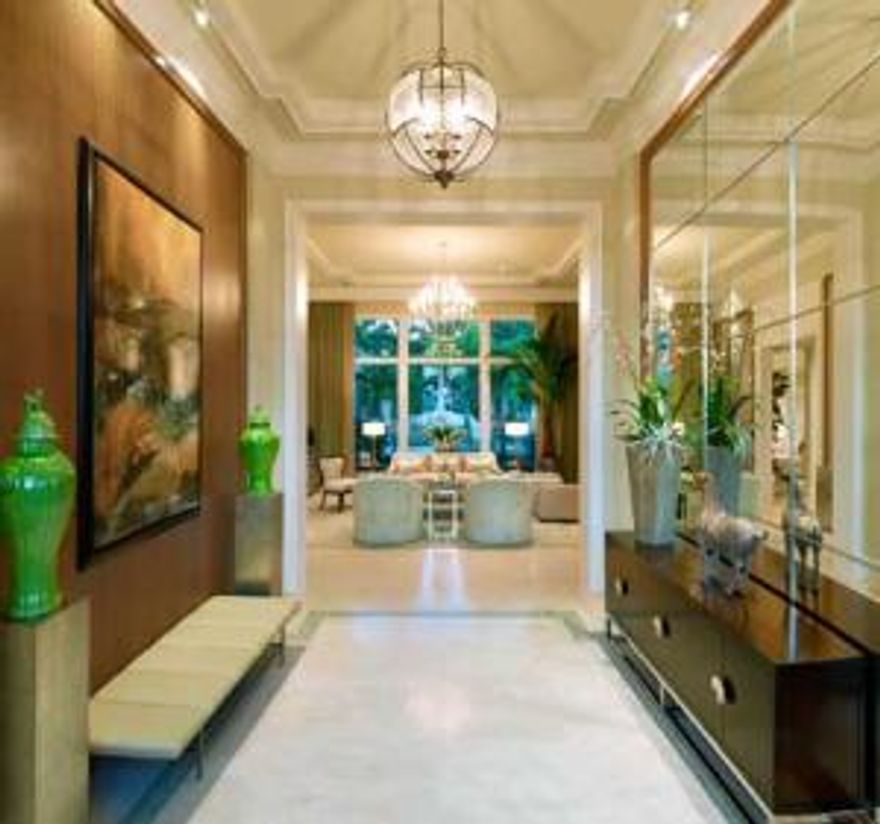 Beautifully appointed custom 2-story Bentley floor plan on desirable 1/2 acre lot with stunning golf course view.  This home boasts an expansive lanai with summer kitchen, beautiful wine wall, theater room, home office, elevator, loft, tons of storage and beautiful custom pool and spa.