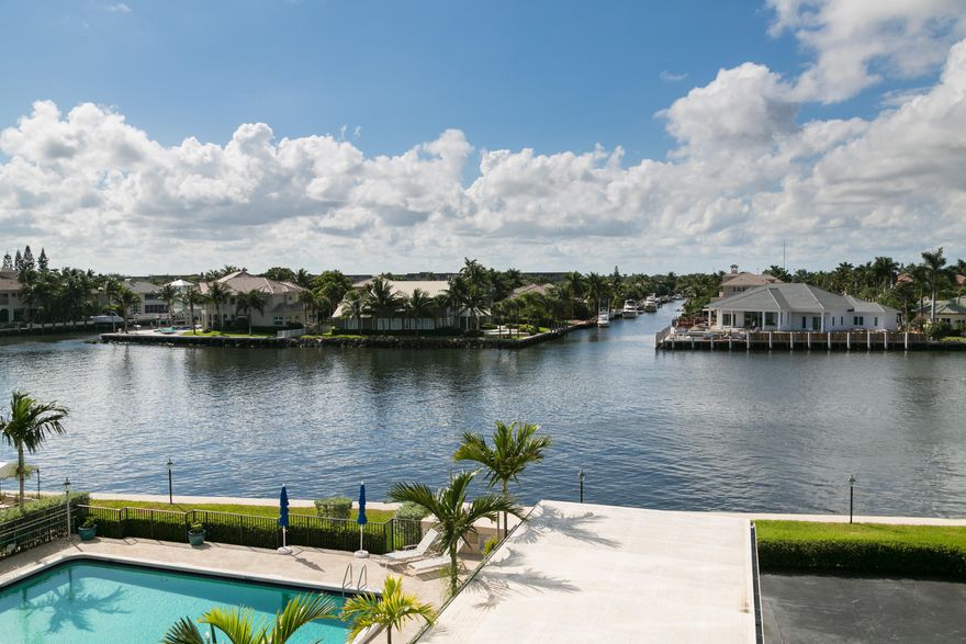 Welcome home to the Court of Delray! Ideally located right on A1A on the intracoastal, this pristine, 4th floor, direct intracoastal northwest corner unit is exquisite. Light and bright, gorgeous views surround you from every room. The unit boasts full impact glass, Crema Marfil marble flooring, spacious eat-in kitchen with quartz counter tops and stainless steel appliances, built out walk-in closets, large laundry room, and covered carport + ample guest parking. The building has a double entry lobby with fitness center, sauna, community room, heated pool directly on the intracoastal with private barbeque area, and private ocean access right across the street. Minutes to downtown  Atlantic Avenue & within walking distance to the new Delray Place plaza home to dining, shopping and more!