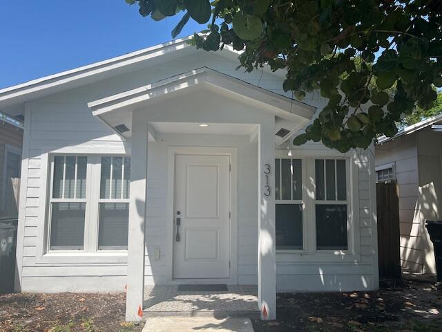 Lake Worth utilities for water and electric. Cat and/or dog under 50 lbs. accepted with $250 pet fee.