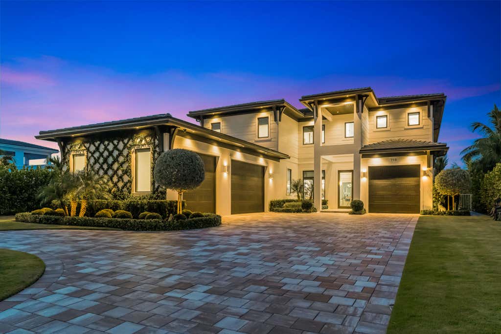 Photo of 715 Ibis Way, North Palm Beach, FL 33408 (MLS # B26066758)