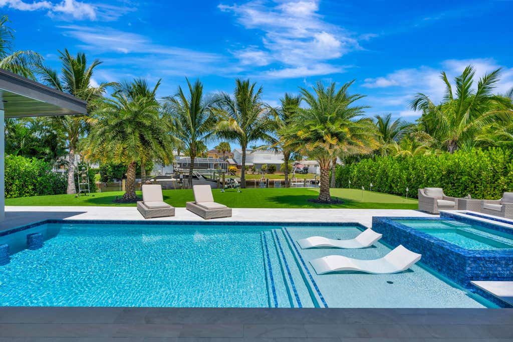 Photo of 715 Ibis Way, North Palm Beach, FL 33408 (MLS # B26066758)