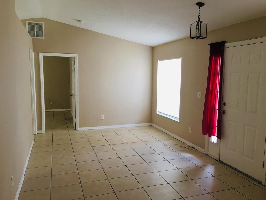 Photo of 1952 SW Hickock Ter, Port Saint Lucie, FL 34953 (MLS # R11010988)