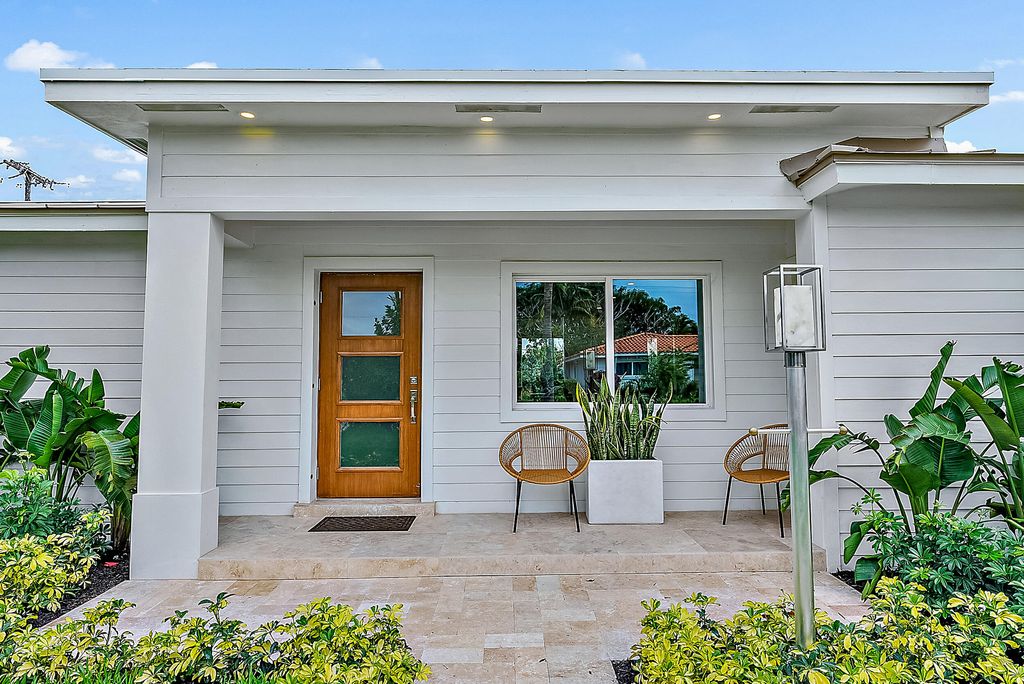 Photo of 310 Edmor Road, West Palm Beach, FL 33405 (MLS # R11145076)