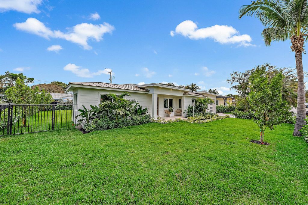 Photo of 310 Edmor Road, West Palm Beach, FL 33405 (MLS # R11145076)