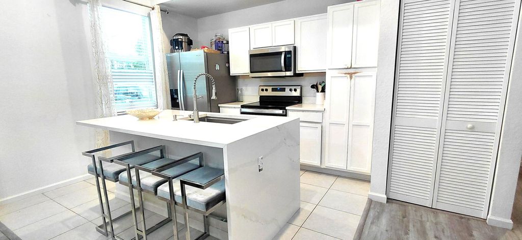 Photo of 8878 Lake Worth Road #111, Lake Worth, FL 33467 (MLS # R11167619)