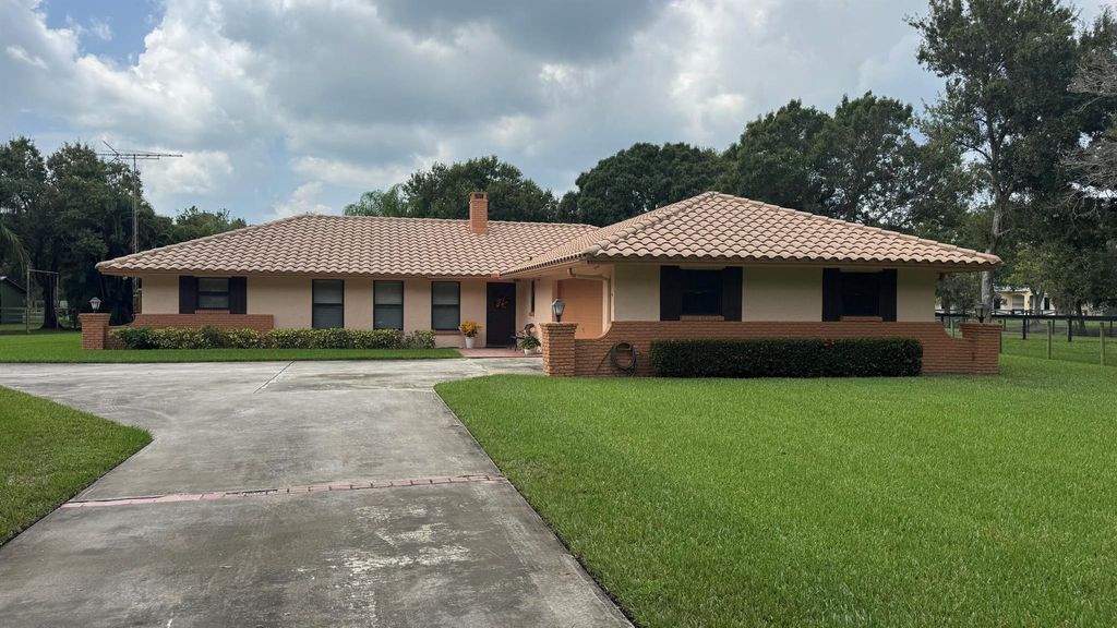 Photo of 5950 SW Mapp Road, Palm City, FL 34990 (MLS # R11124077)