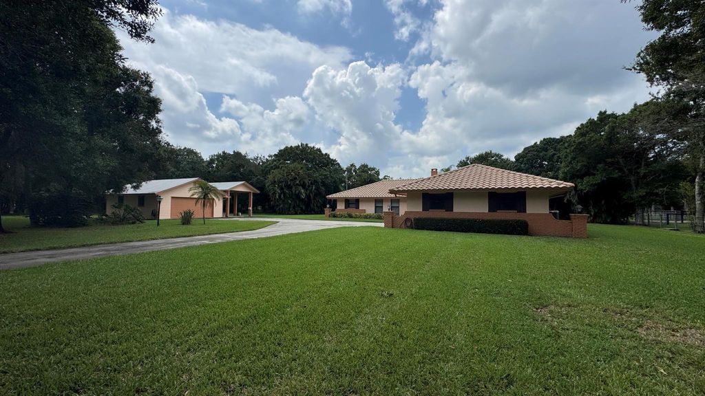 Photo of 5950 SW Mapp Road, Palm City, FL 34990 (MLS # R11124077)
