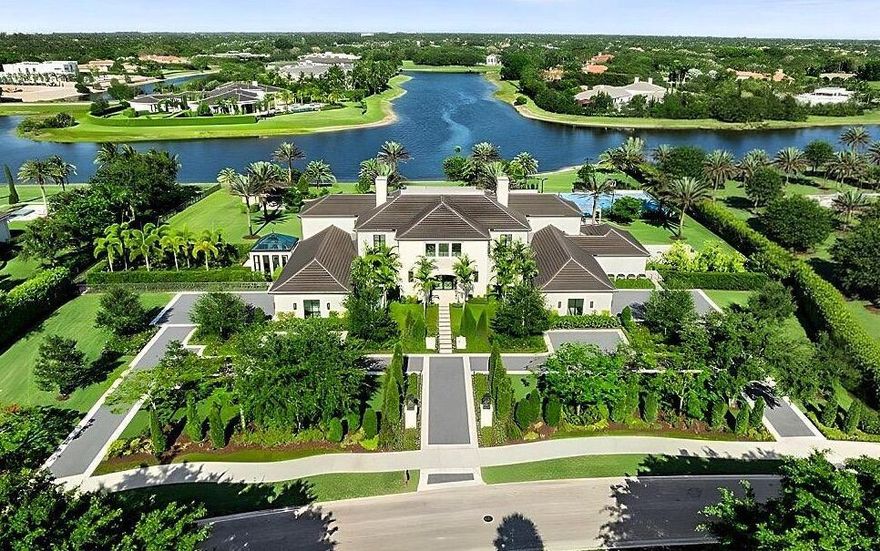 La Maison Blanche -- The Pinnacle of Lakefront Luxury; Stone Creek Ranch, Delray BeachWelcome to La Maison Blanche, a rare architectural triumph that redefines estate living in Stone Creek Ranch -- an ultra-private enclave of only 37 grand compounds spread across nearly 200 verdant acres in the heart of Palm Beach County. Quietly known as home to titans of industry, global entertainers, and legacy families, this community represents the pinnacle of South Florida luxury living -- where privacy, prestige, and power harmonize behind guarded gates.This 16,000+ SF east-facing lakefront estate is a masterstroke of design and detail, brought to life by Ellemar Builders, the celebrated visionaries at Affiniti Architects, and curated by internationally renowned Marc Michaels ->