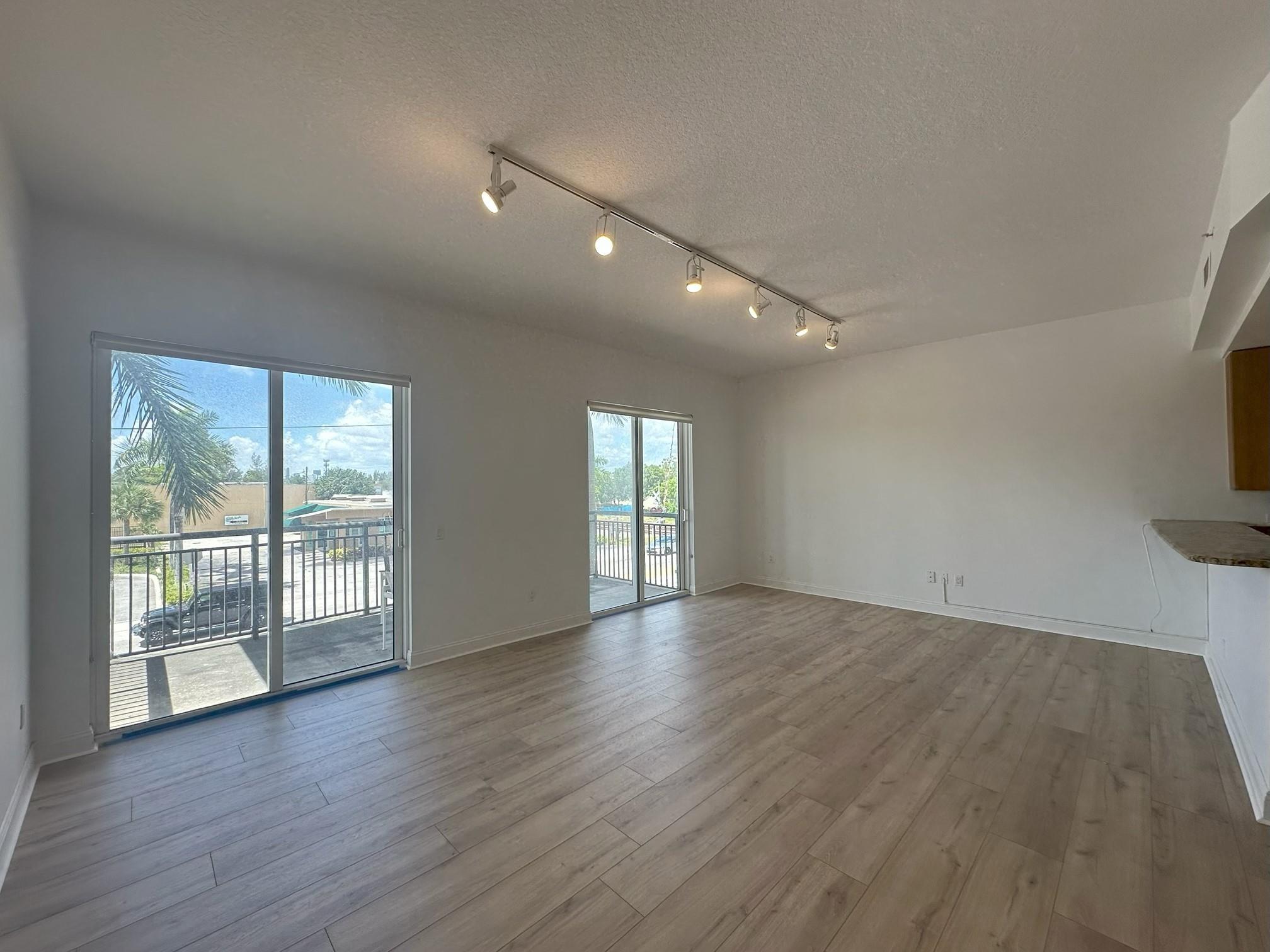 New floors and New paint. Bright sunny south facing one bedroom and one and a half bath located at Wilton Station. Granite counter tops, 42" cabinets and stainless steel appliances. AC is about 3 years old. Custom closet. Snack bar and open concept. Large balcony for entertaining. A gated pet friendly community with approximately ten acres. Resort style pool with relaxing waterfalls. Clubhouse with fitness center, media room, library, party room and catering kitchen.
Two (non-aggressive) dogs up to seventy five pounds each. HOA includes internet, cable, insurance, water, sewer, trash, fully funding reserves, landscaping, pool, and gate house. Watch the virtual tour. Wilton Station is close to 'The Drive', Beaches and Highways.