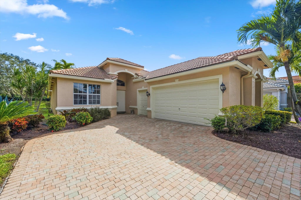 Photo of 3828 Newhaven Lake Drive, Lake Worth, FL 33449 (MLS # R11157617)