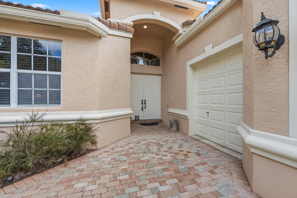 Photo of 3828 Newhaven Lake Drive, Lake Worth, FL 33449 (MLS # R11157617)