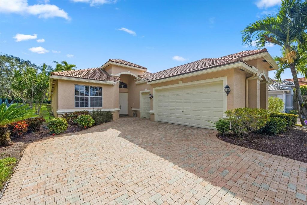 Photo of 3828 Newhaven Lake Drive, Lake Worth, FL 33449 (MLS # R11157617)