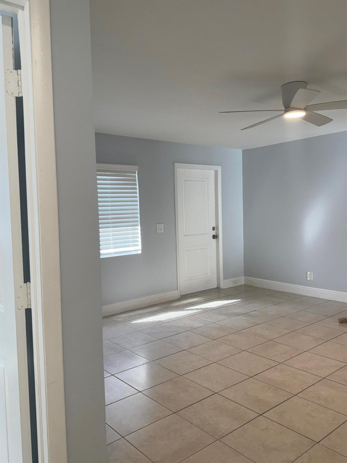 Move into this stunning duplex featuring 3 spacious bedrooms. Enjoy ample natural light and security with impact windows and a NEW ROOF for peace of mind. LOCATION!! Conveniently located near Palm Beach State College, Florida JFK Hospital, public parks, supermarkets, restaurants and gas stations, I-95, and Lake Worth downtown. Perfect for individuals or small families seeking comfort and accessibility in a residential setting. NO HOA. NO APPLICATION FEE.NO CREDIT SCORE REQUIRED.