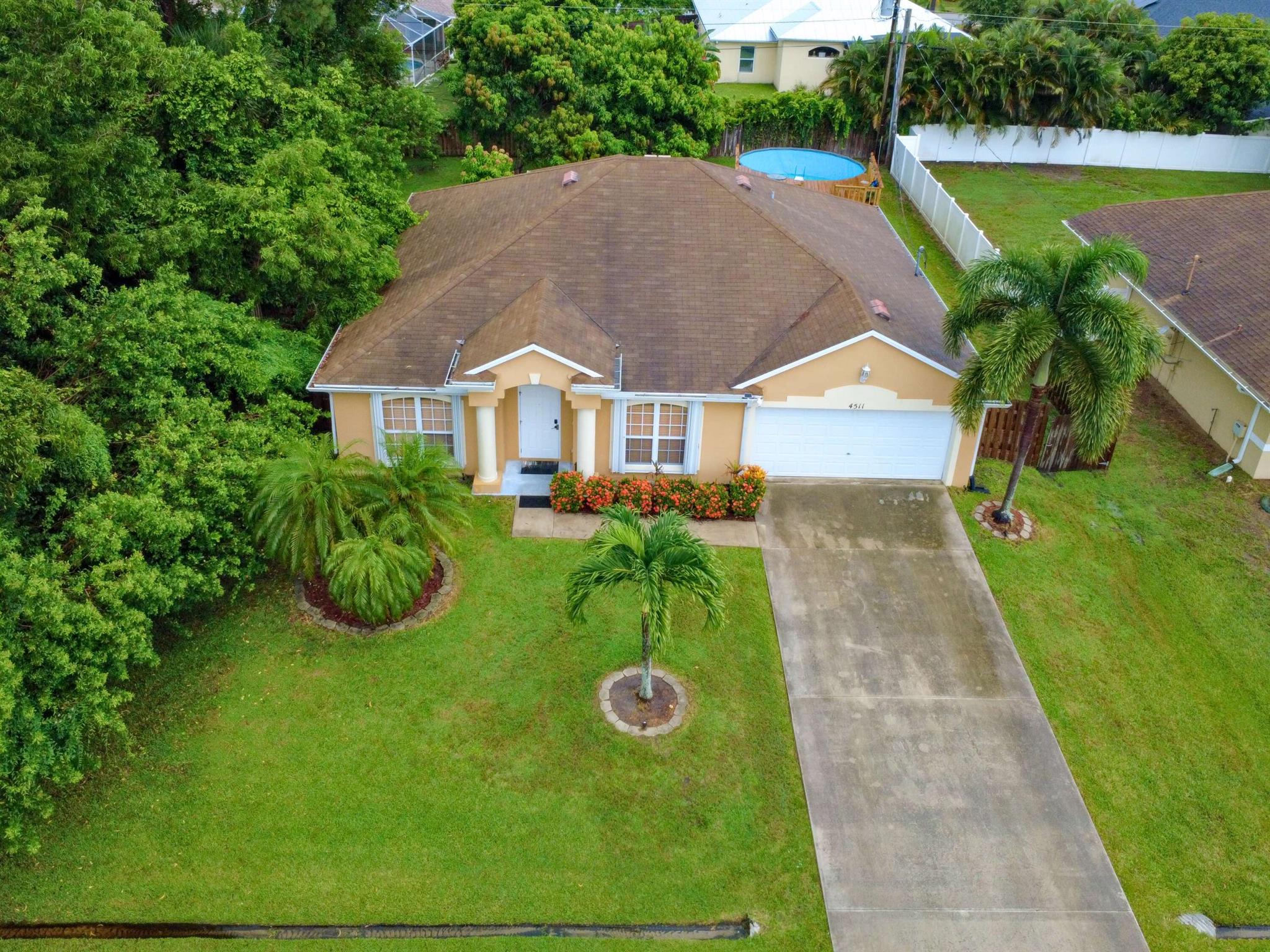 Perfect Package Of Space, Style, And Comfort. This home consist 3 bedrooms, 2 baths and 2 car garage. Interior features living room, formal dining room, kitchen & family room with open floor plan. Interior freshly painted, laundry room, A/C replaced 2020, hot water heater 2016, and accordion hurricane shutters installed 2014.