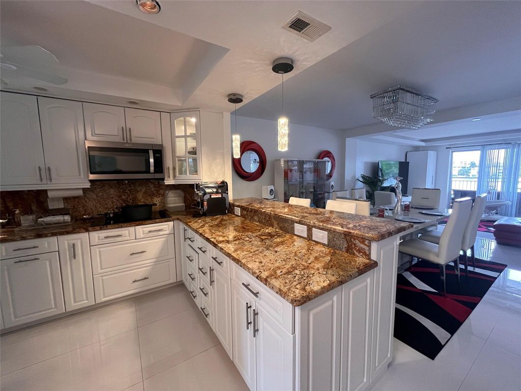 Photo of 400 Golden Isles Drive #20, Hallandale Beach, FL 33009 (MLS # F10551555)