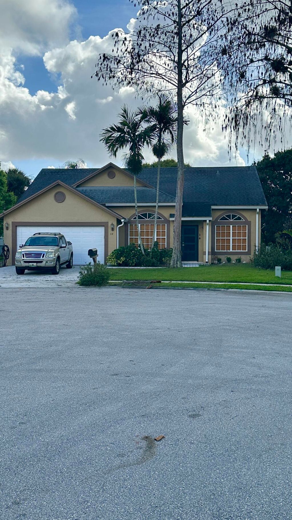 Photo of 112 Princess Court, Royal Palm Beach, FL 33411 (MLS # B26003242)