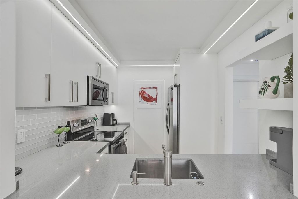 Photo of 4025 N Federal Highway #220, Oakland Park, FL 33308 (MLS # F10535958)