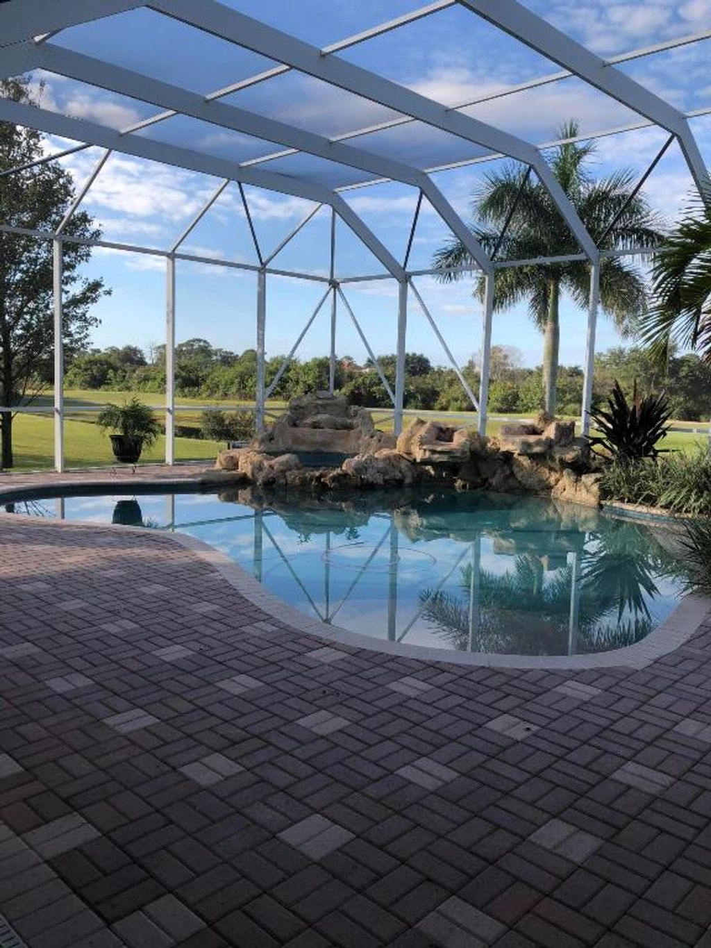 Photo of 1256 SW Squire Johns Lane, Palm City, FL 34990 (MLS # R10937081)