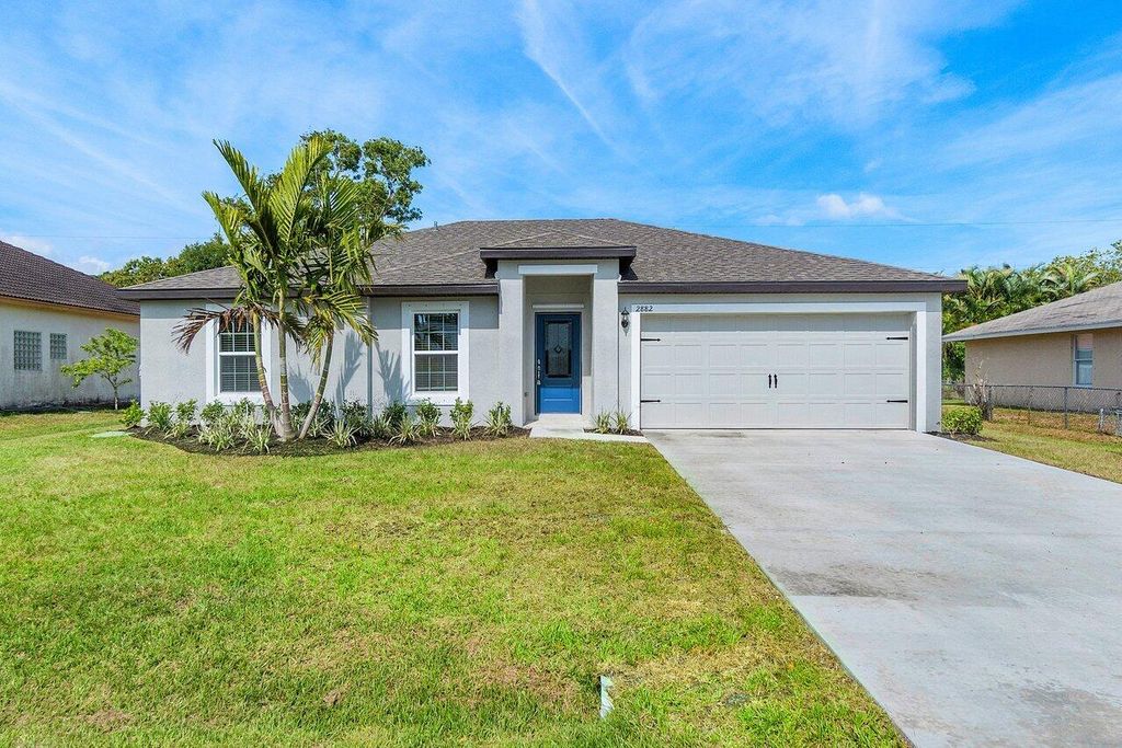 Photo of 2882 SW Fluvia Street, Port Saint Lucie, FL 34953 (MLS # R10982648)