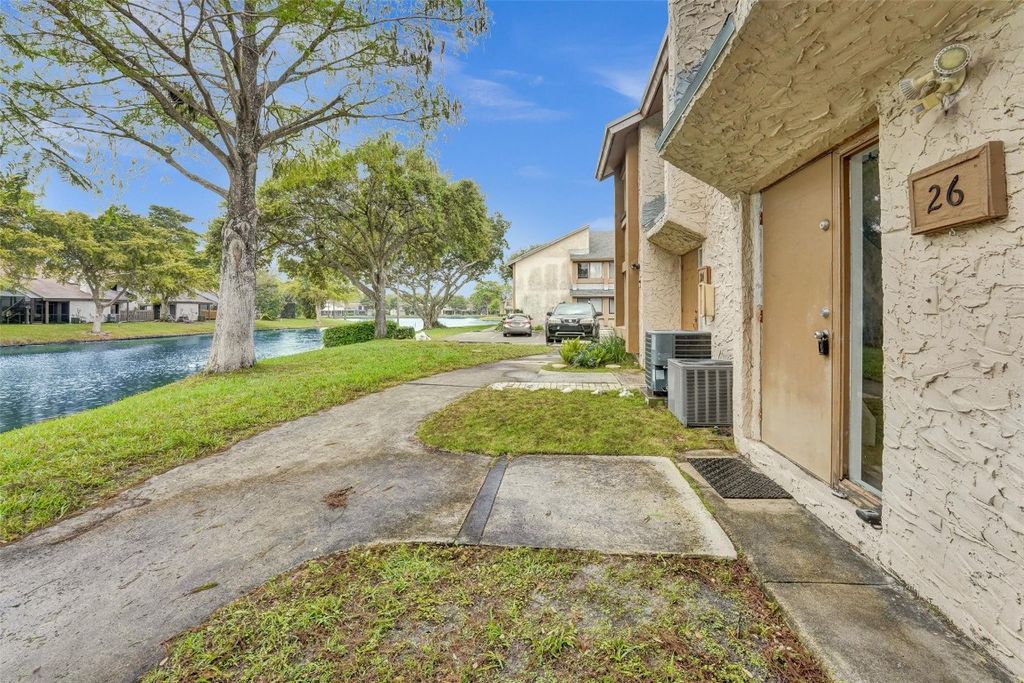 Photo of 26 Wimbledon Lake #248, Plantation, FL 33324 (MLS # F10491401)