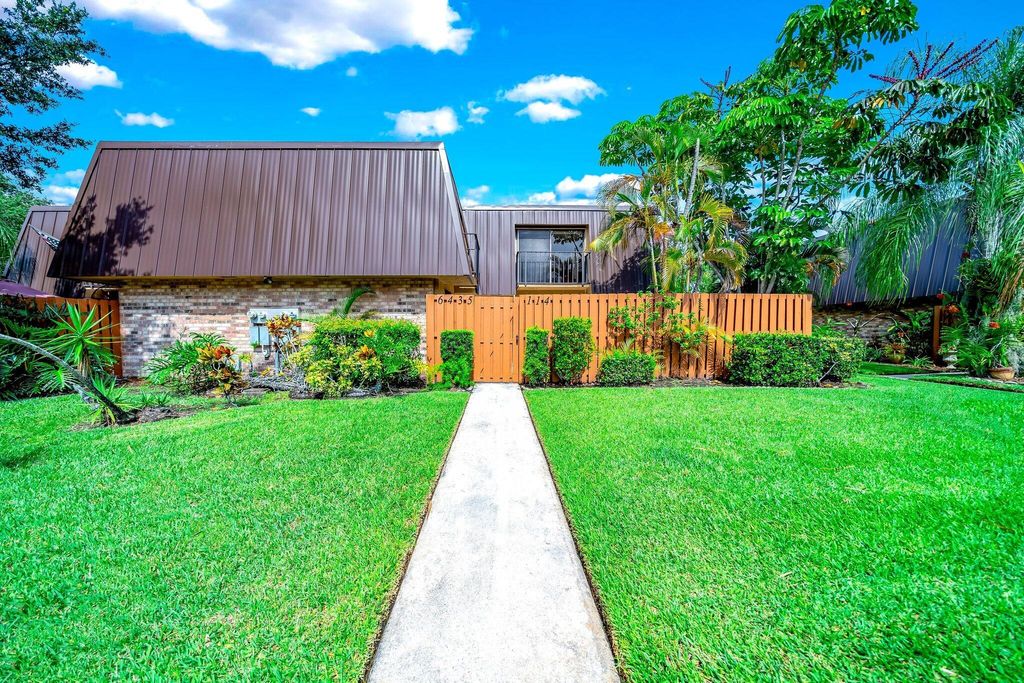 Photo of 6435 SE Windsong Lane #114, Stuart, FL 34997 (MLS # R10899581)