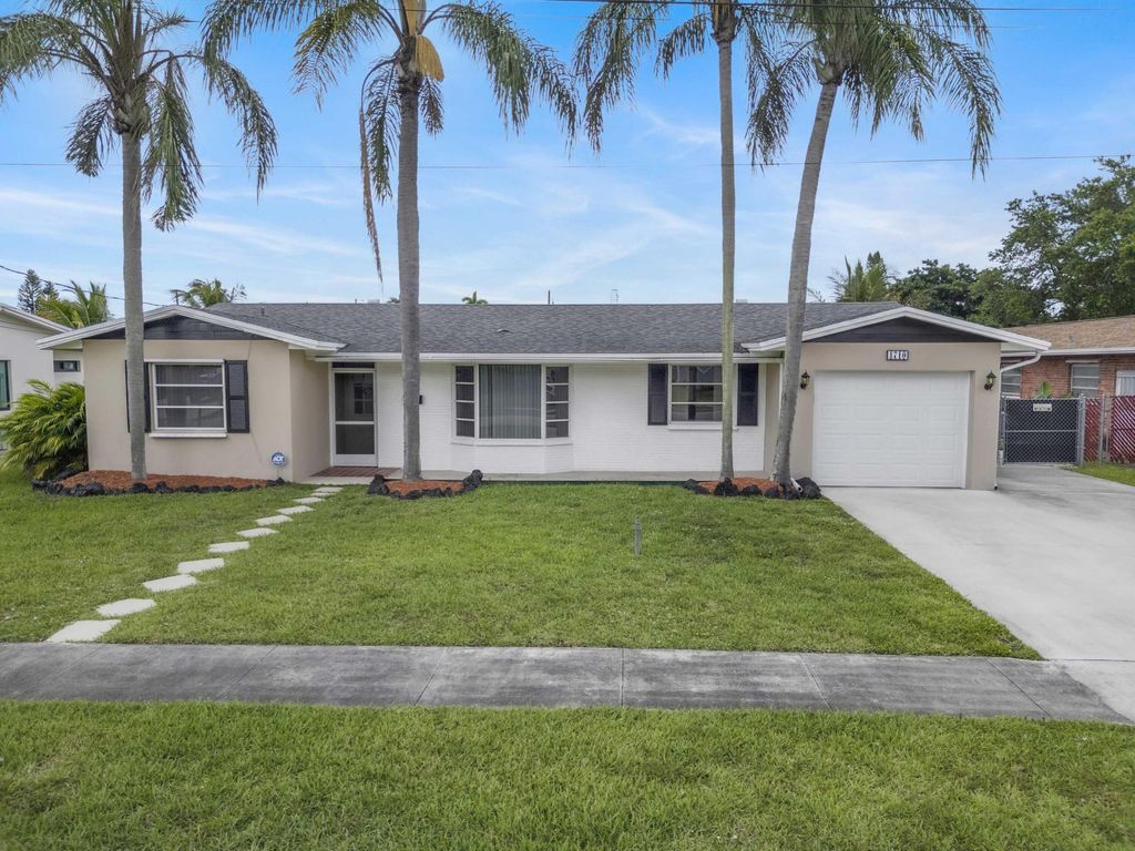 Photo of 1710 W River Drive, Margate, FL 33063 (MLS # B26034674)