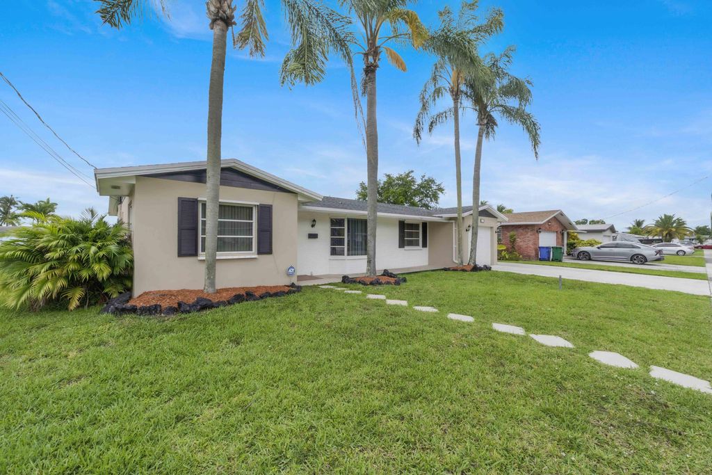 Photo of 1710 W River Drive, Margate, FL 33063 (MLS # B26034674)