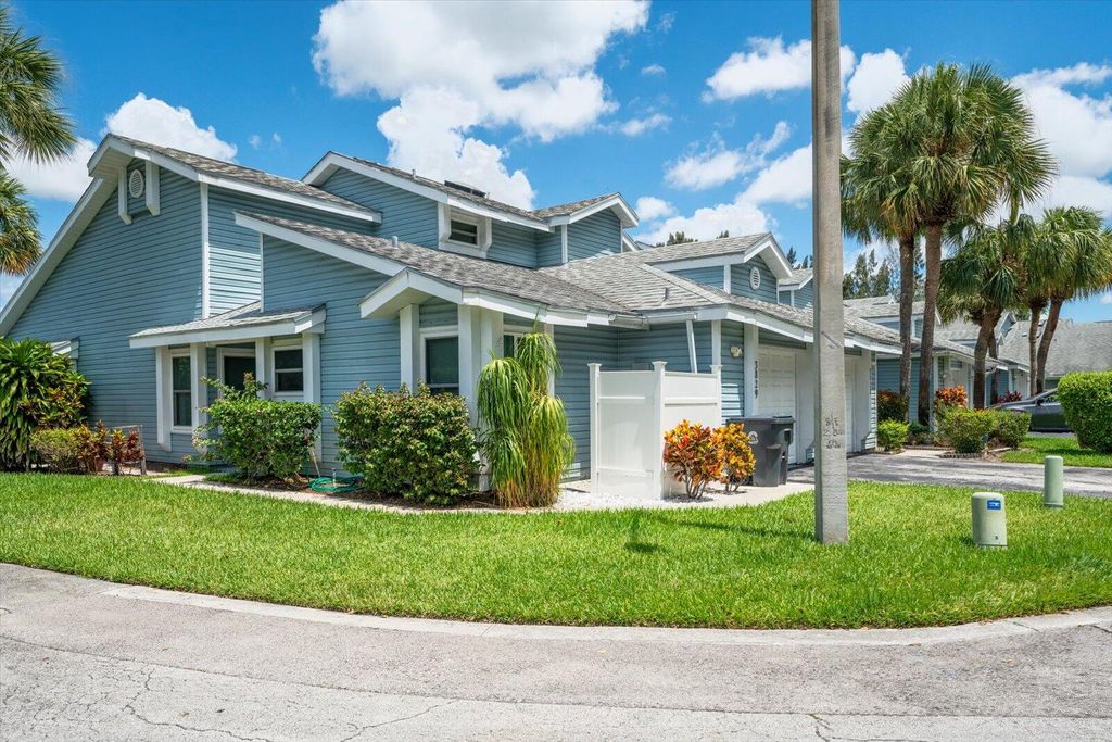 Photo of 3829 Island Club Circle Cir E, Lake Worth Beach, FL 33462 (MLS # R10806584)