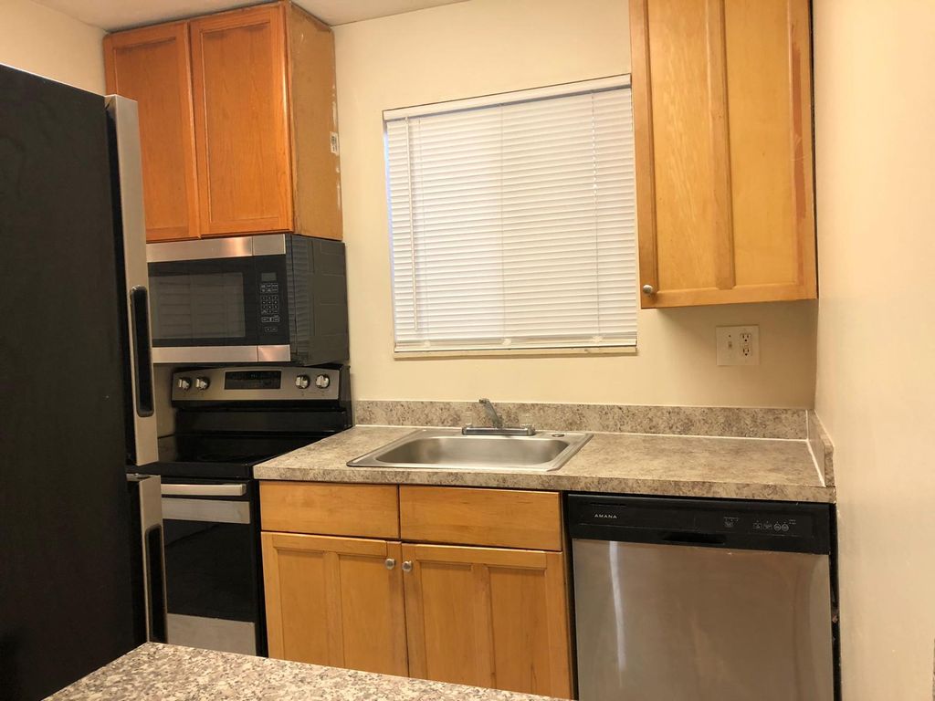 Photo of 6100 Forest Hill Boulevard #102, West Palm Beach, FL 33415 (MLS # R10959515)