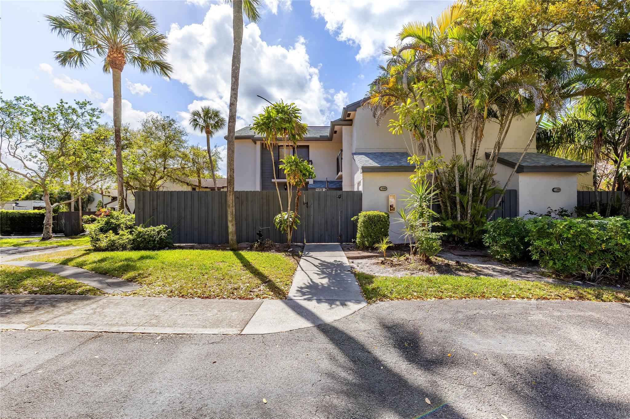 Welcome to Karanda Village in the heart of Coconut Creek! This 2-bedroom, 2.5-bathroom townhome features a spacious open layout, an updated kitchen with granite countertops, and a fenced courtyard patio, perfect for entertaining. Upstairs, enjoy two master suites, each with private balconies and en-suite bathrooms. Resort-style amenities include two pools, a fitness center, sauna, tennis and basketball courts, a playground, and a scenic bike/jogging path. Located near Gerber Park, Promenade at Coconut Creek, shopping, dining, and entertainment, with easy access to Florida’s Turnpike and I-75. Don’t miss this move-in-ready townhome in a highly desirable community—schedule your private tour today!
