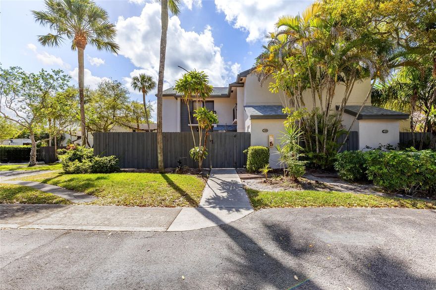 Welcome to Karanda Village in the heart of Coconut Creek! This 2-bedroom, 2.5-bathroom townhome features a spacious open layout, an updated kitchen with granite countertops, and a fenced courtyard patio, perfect for entertaining. Upstairs, enjoy two master suites, each with private balconies and en-suite bathrooms. Resort-style amenities include two pools, a fitness center, sauna, tennis and basketball courts, a playground, and a scenic bike/jogging path. Located near Gerber Park, Promenade at Coconut Creek, shopping, dining, and entertainment, with easy access to Florida’s Turnpike and I-75. Don’t miss this move-in-ready townhome in a highly desirable community—schedule your private tour today!