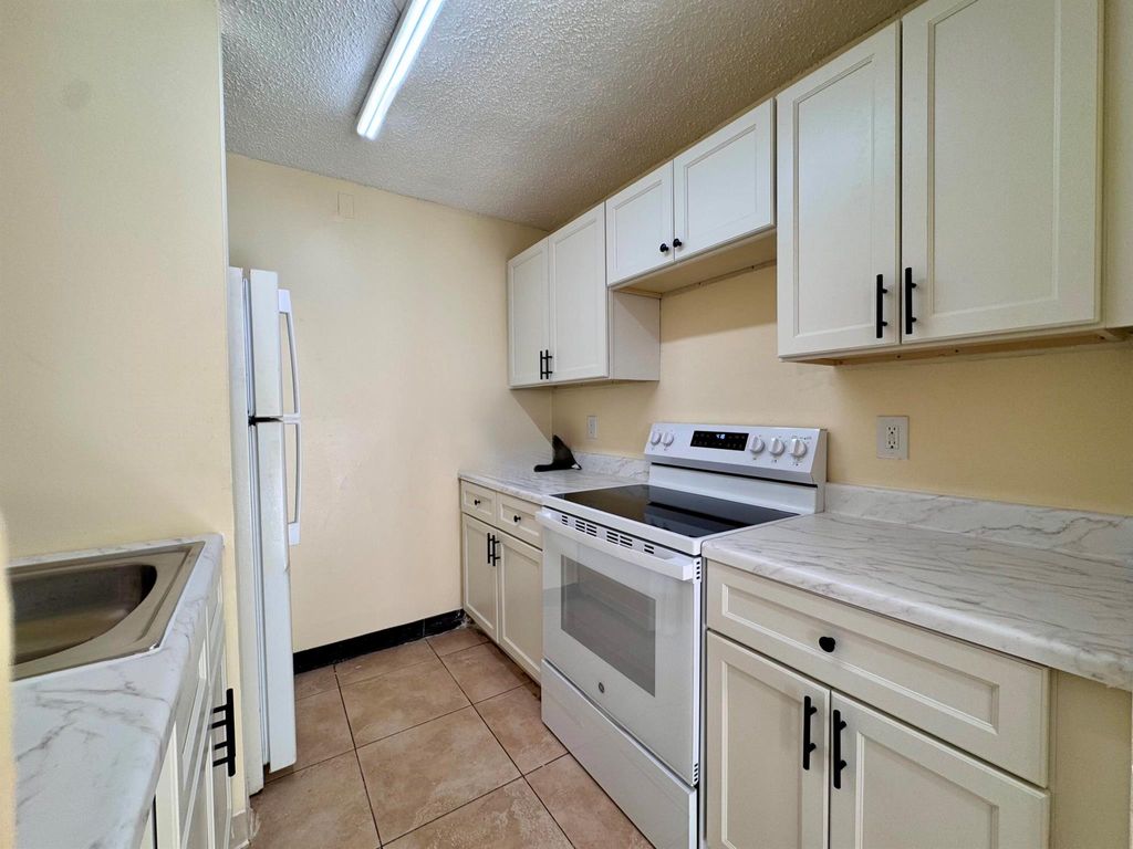 Photo of 710 Meadows Circle, Boynton Beach, FL 33436 (MLS # R11079879)