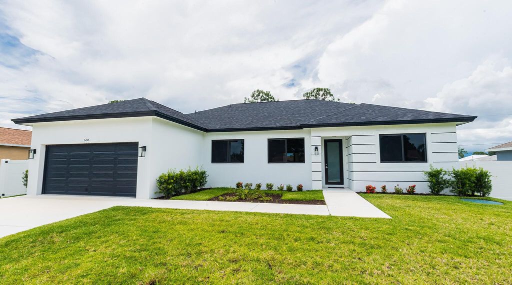 Photo of 686 SW Empire Street, Port St Lucie, FL 34983 (MLS # R10896113)