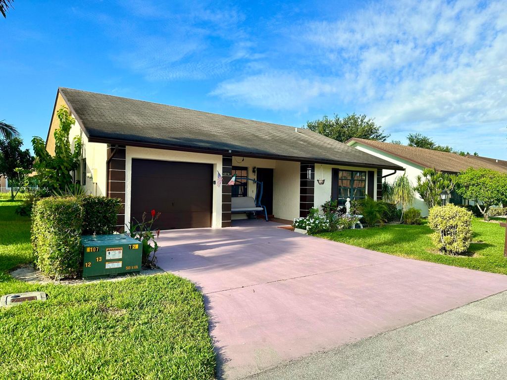 Photo of 6273 Tall Cypress Circle, Greenacres, FL 33463 (MLS # R11169844)