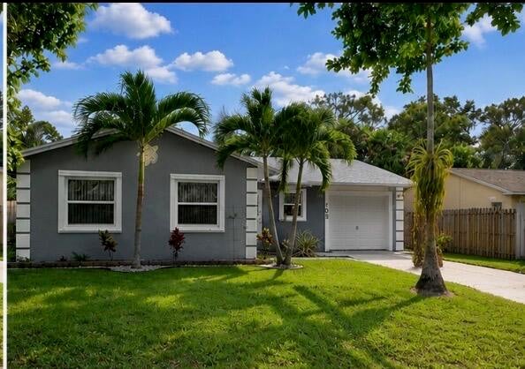 Photo of 3409 Wry RD, Lake Worth, FL 33467 (MLS # B26060655)
