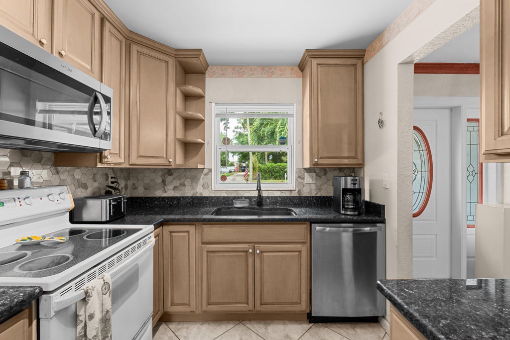 Photo of 3409 Wry RD, Lake Worth, FL 33467 (MLS # B26060655)