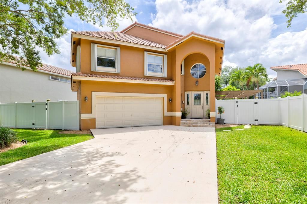 Photo of 6021 NW 57th Way, Parkland, FL 33067 (MLS # R10721528)