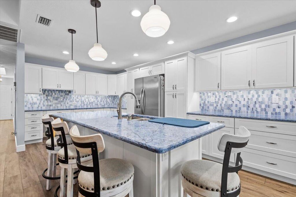 Photo of 959 NE Dahoon Terrace, Jensen Beach, FL 34957 (MLS # R11021861)