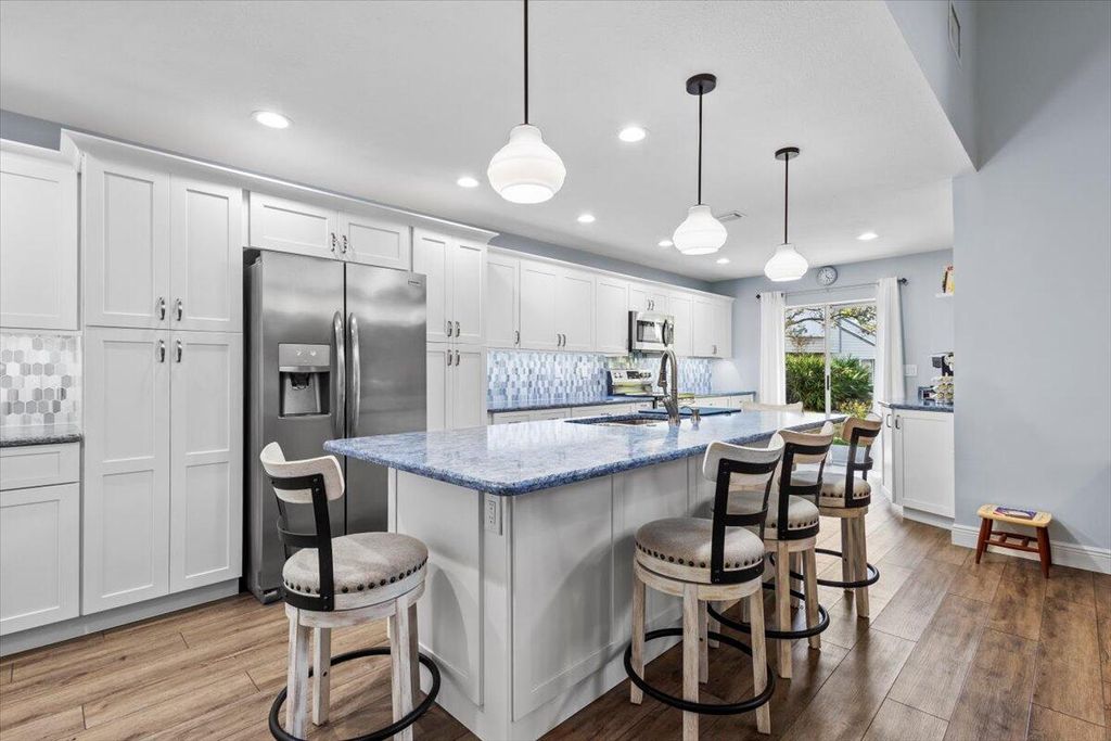 Photo of 959 NE Dahoon Terrace, Jensen Beach, FL 34957 (MLS # R11021861)